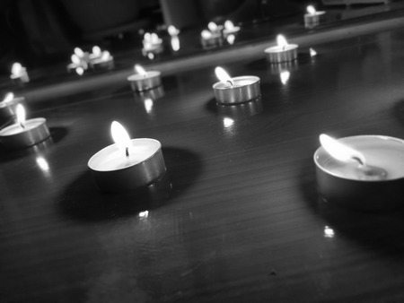 Nice background with candle lights on the floorの写真素材