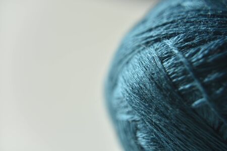 bright turquoise wool ball on the white backgroundの写真素材