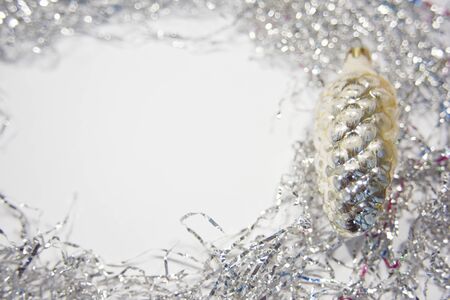 Old christmas and new year toys made of glass on the white backgtound. Image with empty space for text as a concept of Christmas cards or invitations.の写真素材
