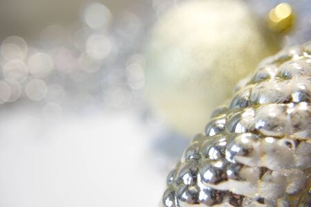 Old christmas and new year toys made of glass on the white backgtound. Image with empty space for text as a concept of Christmas cards or invitations.の写真素材