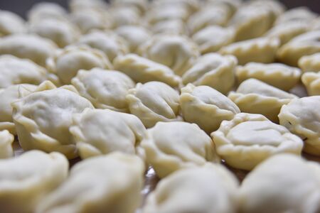 A lot of round dumplings from the close side view. Selective focus.の写真素材