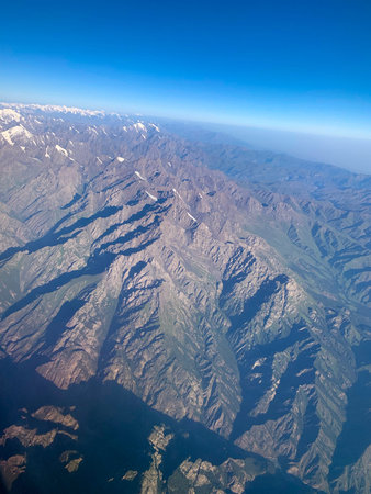 the view from the airplane, flying over the mountains area. Aerial photographyの写真素材