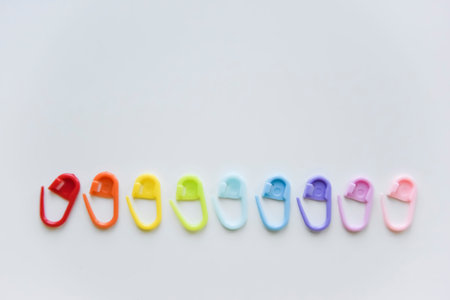 selective focus with blurry effect at colored plastic safety pins