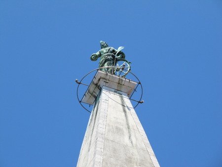 The statue of Euphemia at the top of the campanile of the Saint Euphemia church in Rovinj, Croatia, is a wind direction indicatorの写真素材