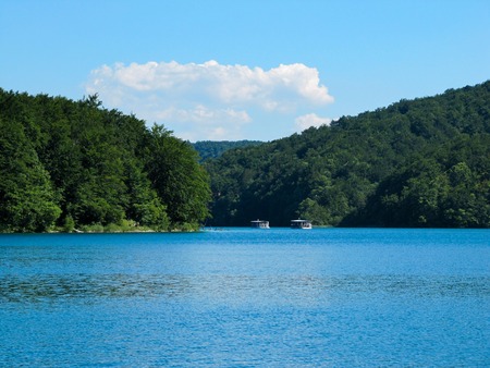 views of the two River boat floating on the lake in the national Park Plitvice lakes, Croatiaの写真素材