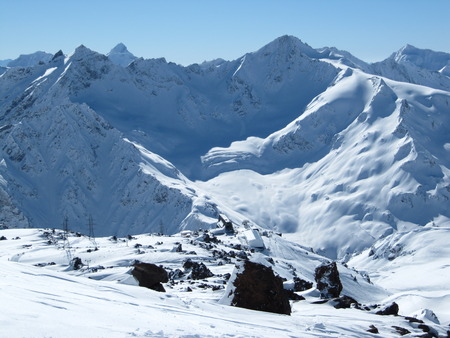 Aerial survey. View of the snow-covered Caucasus range and Mir station on Elbrus on a Sunny frosty day.の写真素材