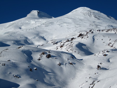 Two peaks of one of the highest mountains in Europe overlooking the ski slopesの写真素材