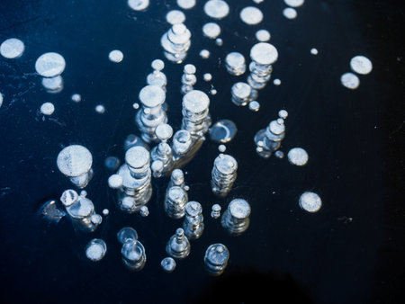 Texture pattern background white Winter, river ice air bubbles stagnant. drawing on ice frost...