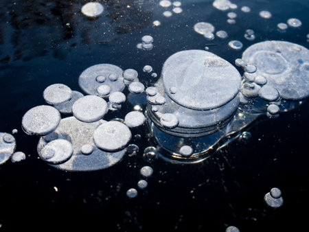 Texture pattern background white Winter, river ice air bubbles stagnant. drawing on ice frost...