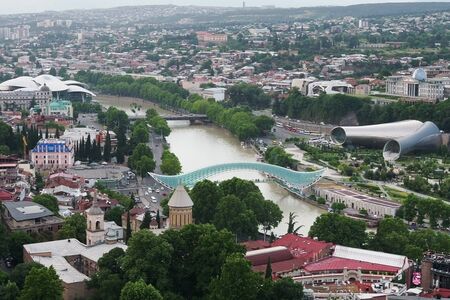 Tbilisi city panorama. Old city, new Summer Rike park, river Kura, the European Square and the Bridge of Peace.のeditorial素材
