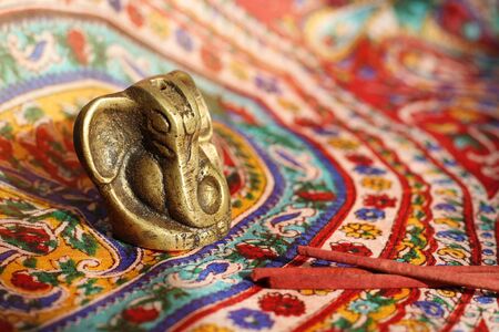 Bronze statuette of the Indian god Ganesha with the head of an elephantの写真素材