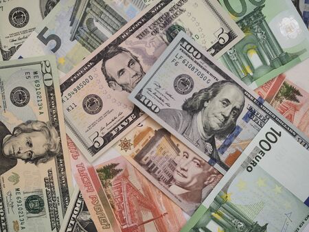 various currencies from countries spanning the World . financial crisis 2020.の写真素材
