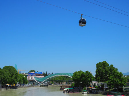 Georgia. Tbilisi. Bridge and cable car cabin. Georgia, Tbilisi - June 2019