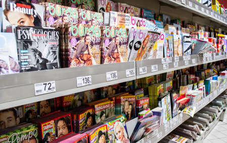 Moscow, Russia, August 2020: Stand for sale with glossy magazines in Russian.のeditorial素材