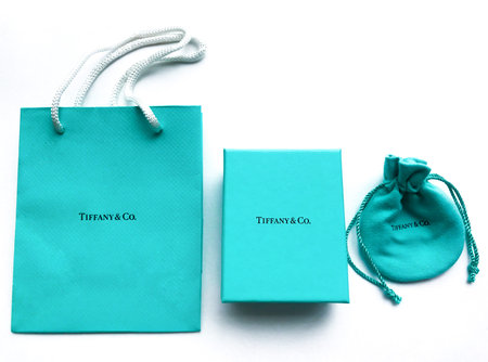Moscow, Russia, August 2019: Signature Tiffany and Co. A variety of branded packaging jewelry brand Tiffany and Co. on white background.のeditorial素材