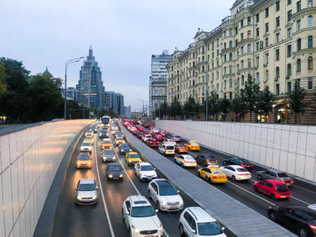 Moscow, Russia, August 2019: Cars are in traffic at the entrance and exit to the tunnel and in the city center. Sadovoe and Mayakovskaya.のeditorial素材