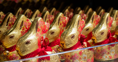 MOSCOW, Russia, February 2021: Close-up of many Lindt chocolate bunnies on the shelf of a company...