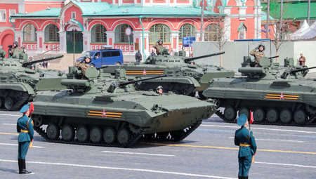 Moscow, Russia, May 2022: Infantry fighting vehicles BMP-2M are passing by Red Square on rehearsal...