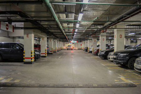 Moscow, Russia, November 2019: Underground car parking on the lower floors of the shopping center.のeditorial素材