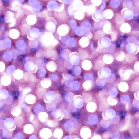 Purple blurry new year pattern. Abstract Christmas seamless background for New Years design wrapping paper. Photo collage with bokeh and blur lights.の写真素材