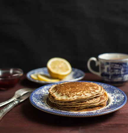 Breakfast in the set, oat muffin and tea with lemon