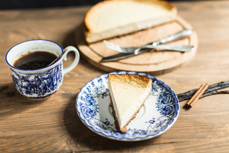 Cheesecake on plate with coffeeの写真素材