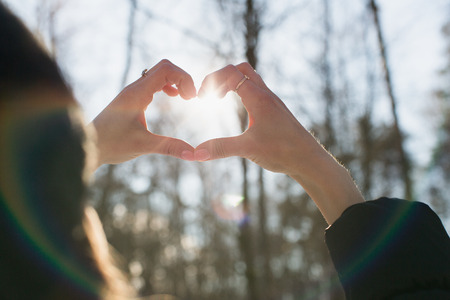 Heart symbol at sunset.の写真素材