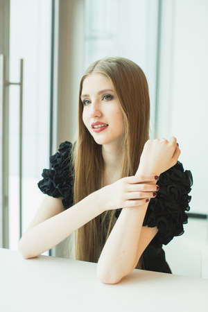 portrait of beautiful young girl in dressの写真素材