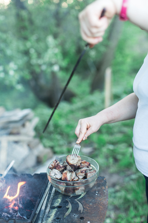 cooking meat on grillの写真素材