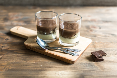 three-layered mousse dessert : chocolate , banana and vanillaの写真素材