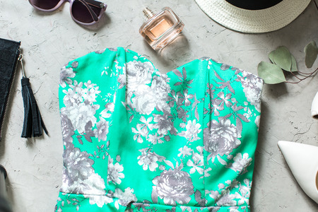 feminine summer look: dress, sunglasses, hat and shoesの写真素材