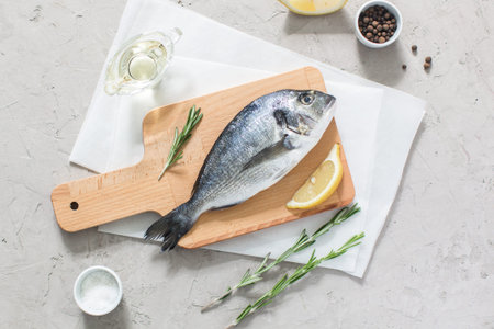 Fresh dorado fish with herbs and pepper