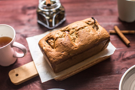 cooked pear cake on cutting boardの写真素材
