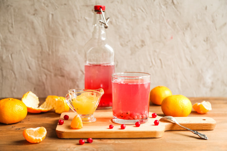 Glass of fresh red currants juice with honeyの写真素材