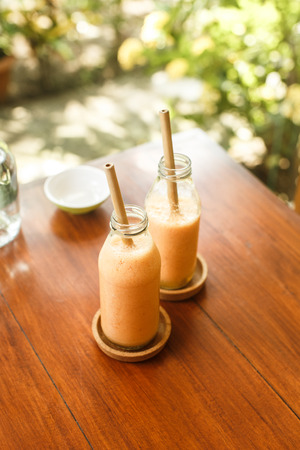 freshly squeezed citrus juice on tableの写真素材