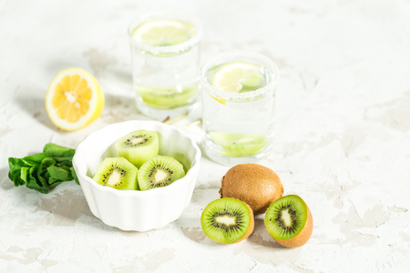 Sliced ??kiwi for drink with mint and lemonの写真素材