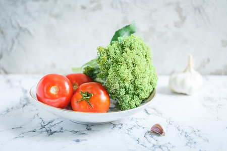 Seasonal vegetables, tomatoes and broccoliの写真素材