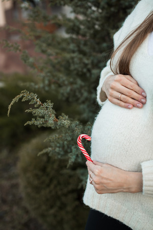 pregnant woman  in nature in autumnの写真素材
