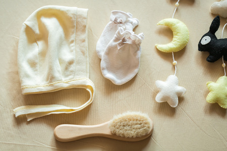 children's accessories, children's mobile, a comb and a capの写真素材