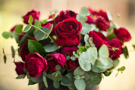 beautiful bouquet of lush red rosesの写真素材