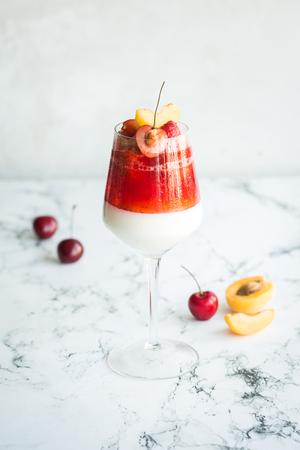 homemade dessert in glass, strawberry and yogurt with berriesの写真素材