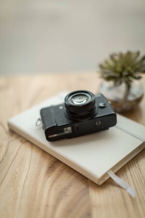 camera and notebook, creative still lifeの写真素材