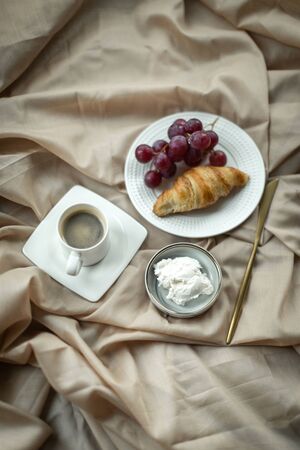 beautiful breakfast with croissant and cheeseの写真素材