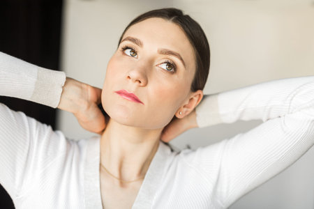 portrait of a young woman on a white background
