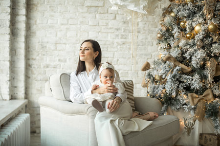 mother hugs little daughter, happy family relationshipの写真素材