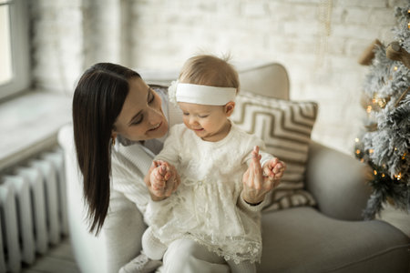mother hugs little daughter, happy family relationshipの写真素材