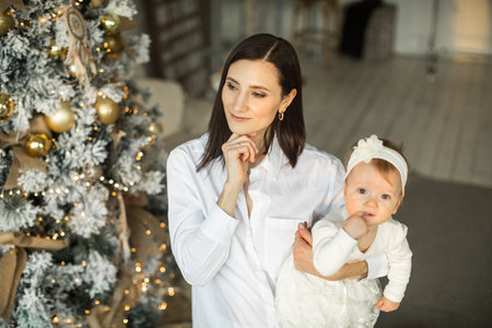 mother hugs little daughter, happy family relationshipの写真素材