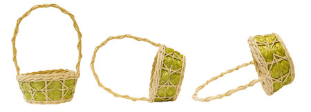 Set of wicker baskets with green hop cones isolated on white backgroundの写真素材