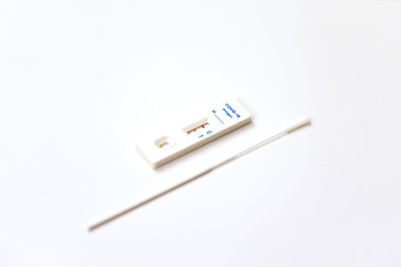 Covid-19 rapid antigen test kit. Positive test result using rapid testing device for COVID-19 virus
