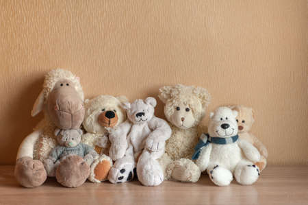 soft toys sit on a neutral backgroundの写真素材